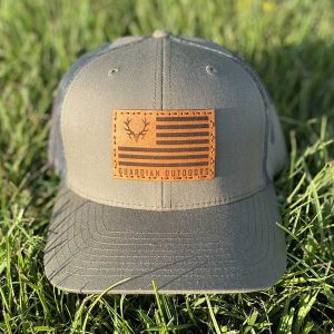 Flag Patch Hat olive drab front with camouflage mesh back leather patch