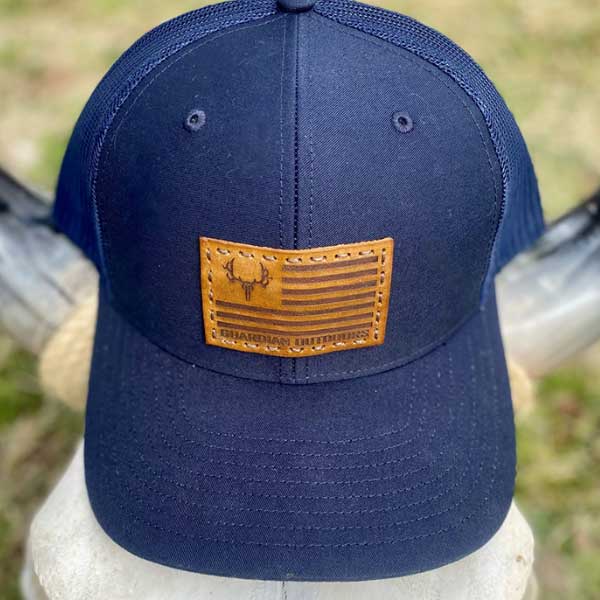 front of youth navy blue flag patch hat with leather patch