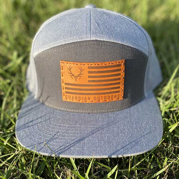 front of gray flat bill flag patch hat leather patch