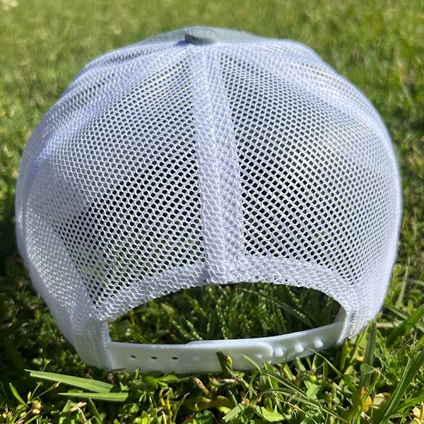 back of old breed hat white mesh adjustable strap